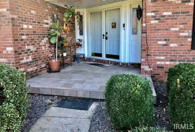 9420 Darmstadt Rd, Evansville, IN 47710 - property entrance featuring brick siding
