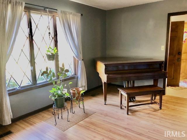 9420 Darmstadt Rd, Evansville, IN 47710 - sitting room with visible vents and light wood-type flooring