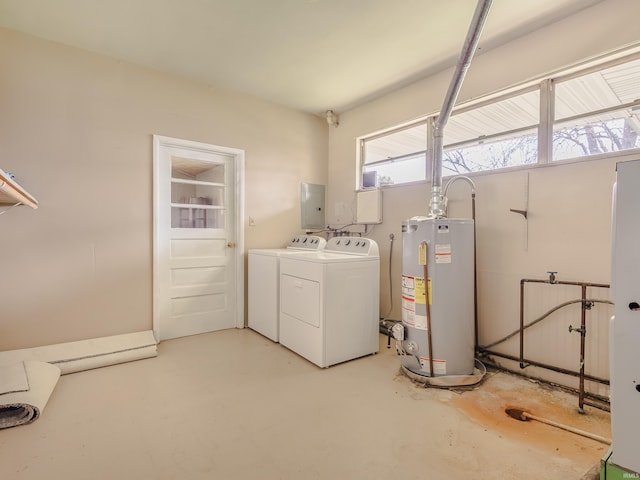 laundry area featuring laundry area, separate washer and dryer, gas water heater, and electric panel