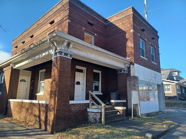 807 Washington Ave, Evansville, IN 47714 - view of front of house with brick siding and a porch