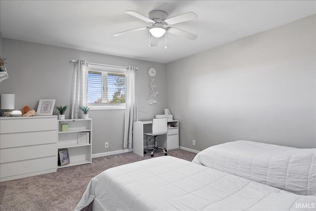 bedroom with baseboards, visible vents, carpet flooring, and a ceiling fan