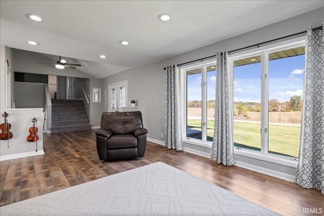 living area featuring wood finished floors, recessed lighting, and a healthy amount of sunlight