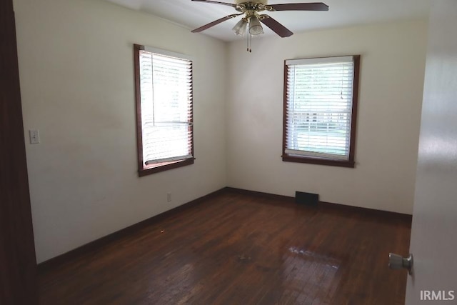 244 Maple St, Mount Vernon, IN 47620 - spare room with dark wood-style floors and ceiling fan