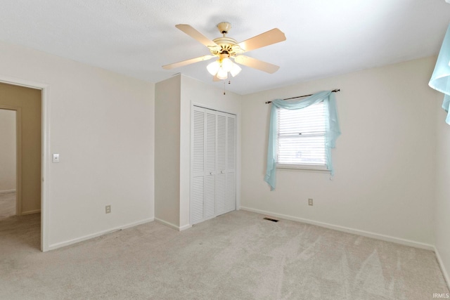 416 Maple St, Tipton, IN 46072 - unfurnished bedroom with carpet flooring, baseboards, a closet, and visible vents