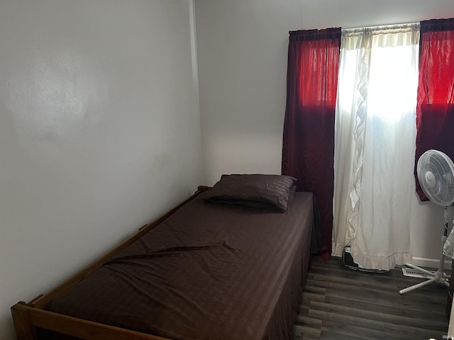 bedroom featuring wood finished floors