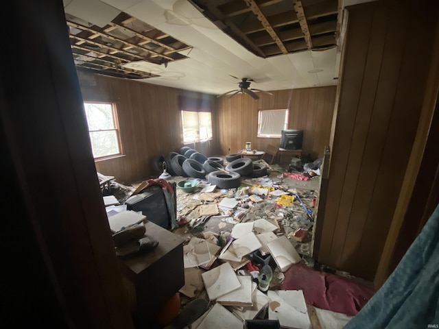 misc room featuring wooden walls