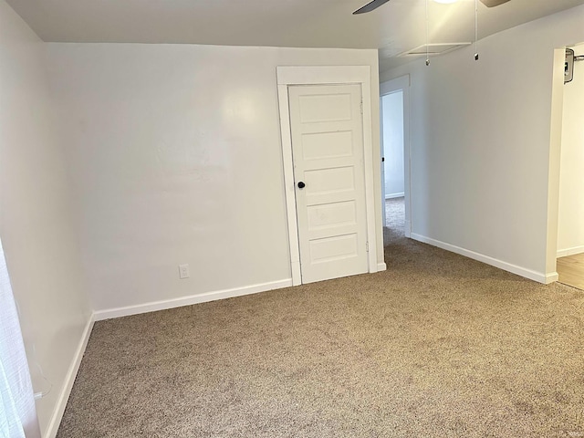 112 W Bond St, Attica, IN 47918 - unfurnished room with a ceiling fan, carpet floors, and baseboards