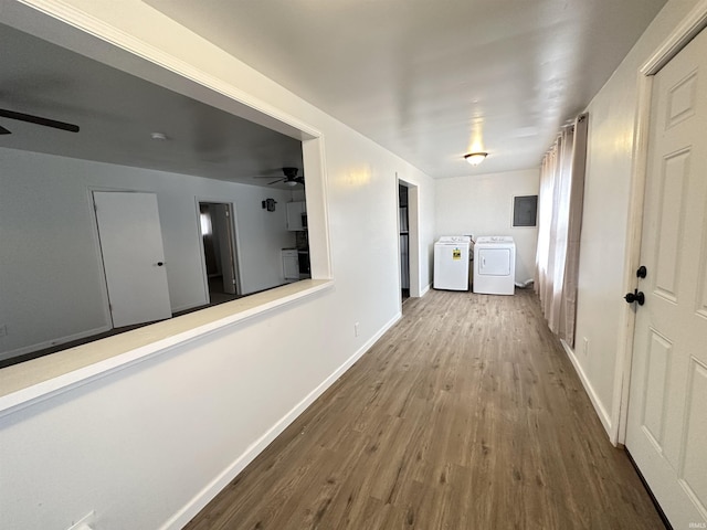 112 W Bond St, Attica, IN 47918 - hall with electric panel, baseboards, washer and dryer, and wood finished floors