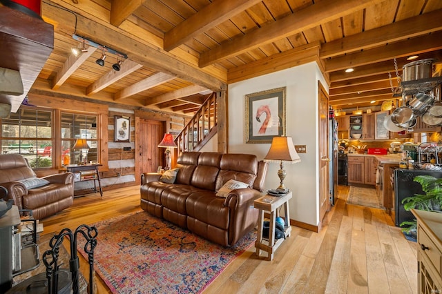 5175 Beanblossom Rd, Nashville, IN 47448 - living area with light wood-type flooring, track lighting, beam ceiling, and wood ceiling