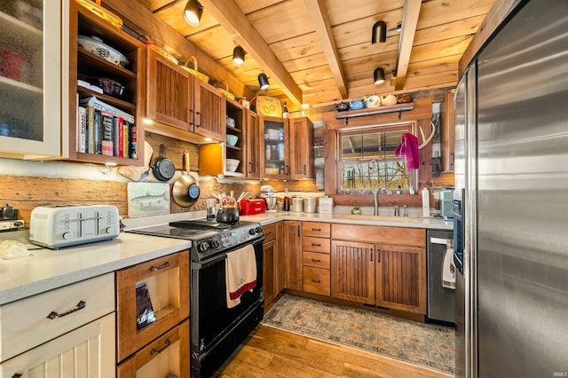 5175 Beanblossom Rd, Nashville, IN 47448 - kitchen featuring stainless steel appliances, wood ceiling, a sink, hardwood / wood-style flooring, and beam ceiling