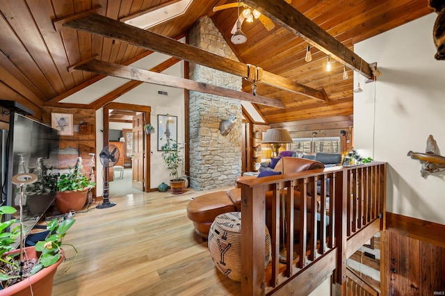 5175 Beanblossom Rd, Nashville, IN 47448 - staircase featuring wood ceiling, vaulted ceiling with beams, ceiling fan, and wood finished floors