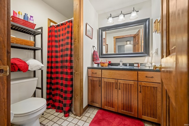 5175 Beanblossom Rd, Nashville, IN 47448 - bathroom featuring a shower with curtain, tile patterned floors, toilet, and vanity
