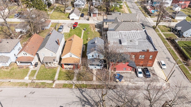 birds eye view of property with a residential view