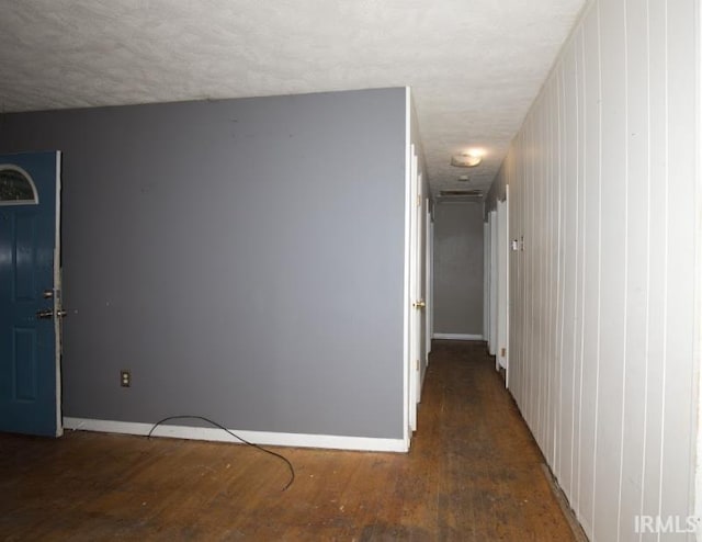 1620 Shelby Ave, Evansville, IN 47714 - corridor with a textured ceiling, baseboards, and wood finished floors