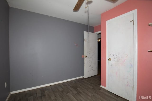 1620 Shelby Ave, Evansville, IN 47714 - spare room featuring baseboards, wood finished floors, and ceiling fan