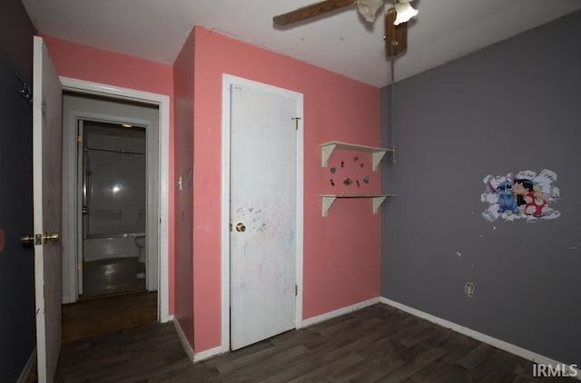 1620 Shelby Ave, Evansville, IN 47714 - unfurnished bedroom featuring baseboards, wood finished floors, and a ceiling fan