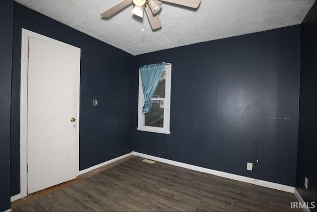 1620 Shelby Ave, Evansville, IN 47714 - spare room with a textured ceiling, baseboards, ceiling fan, and wood finished floors