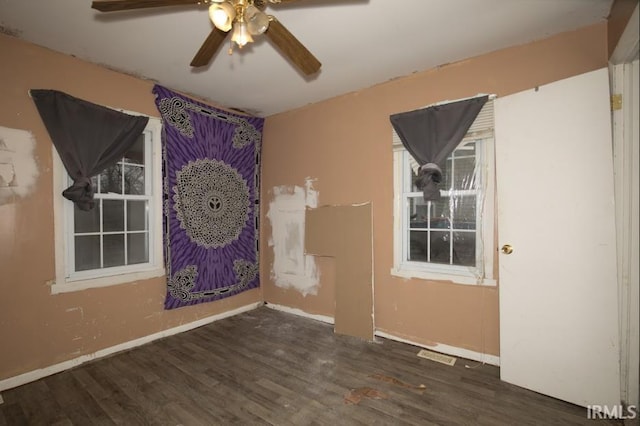 1620 Shelby Ave, Evansville, IN 47714 - spare room featuring wood finished floors, baseboards, and ceiling fan