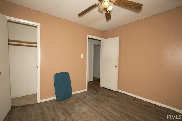 1620 Shelby Ave, Evansville, IN 47714 - unfurnished bedroom with baseboards, a closet, wood finished floors, and ceiling fan