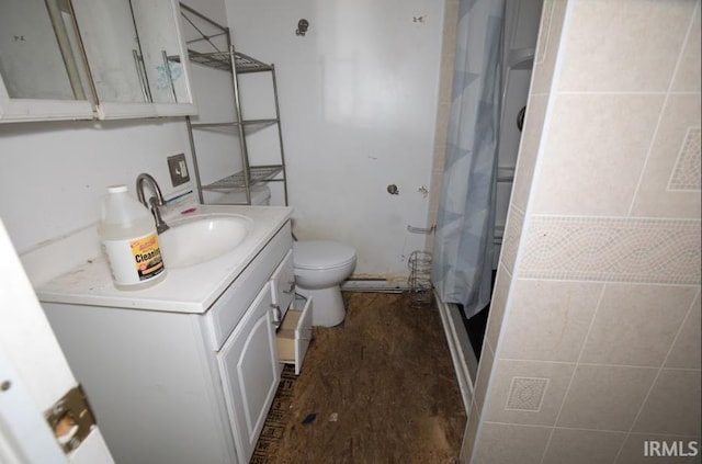 1620 Shelby Ave, Evansville, IN 47714 - full bathroom featuring a shower with curtain, toilet, vanity, and wood finished floors