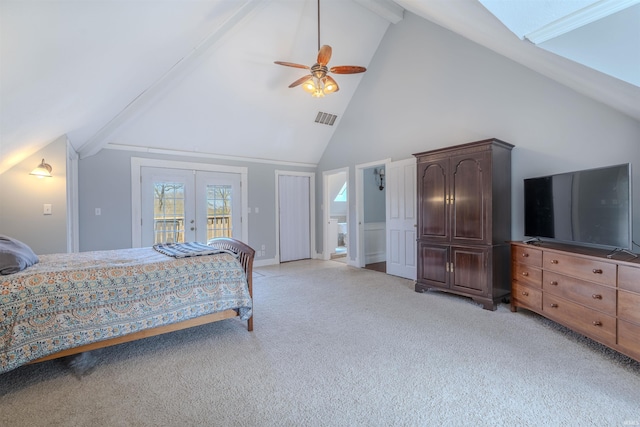 bedroom featuring visible vents, beamed ceiling, access to exterior, french doors, and light colored carpet