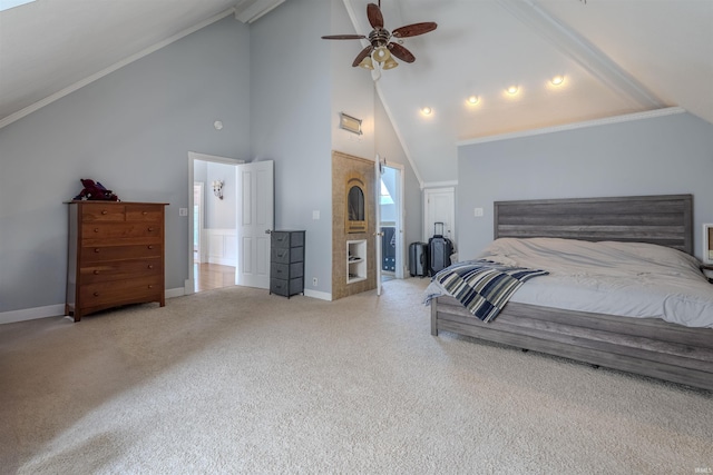 bedroom featuring baseboards, high vaulted ceiling, carpet floors, and ornamental molding