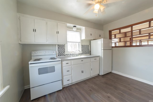 kitchen featuring white cabinetry, a ceiling fan, a sink, and white appliances