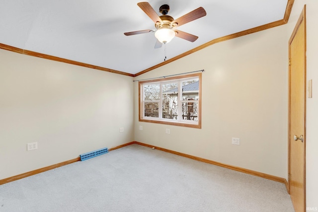 5540 N Willow Ave, Columbia City, IN 46725 - empty room featuring ornamental molding, light carpet, vaulted ceiling, and visible vents