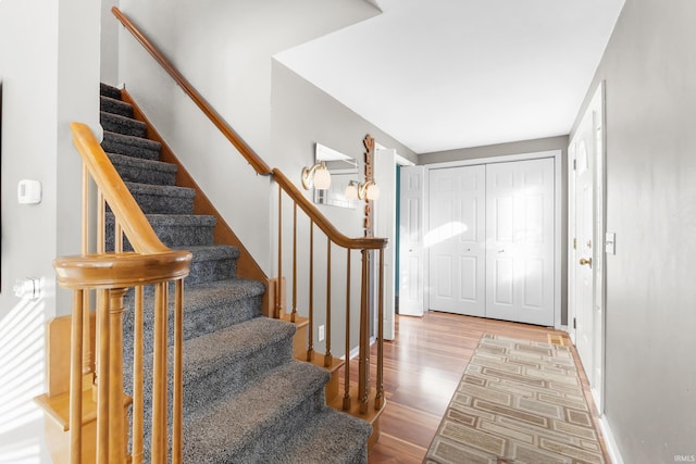 3323 Kiowa Ct, Fort Wayne, IN 46815 - foyer featuring wood finished floors and stairway