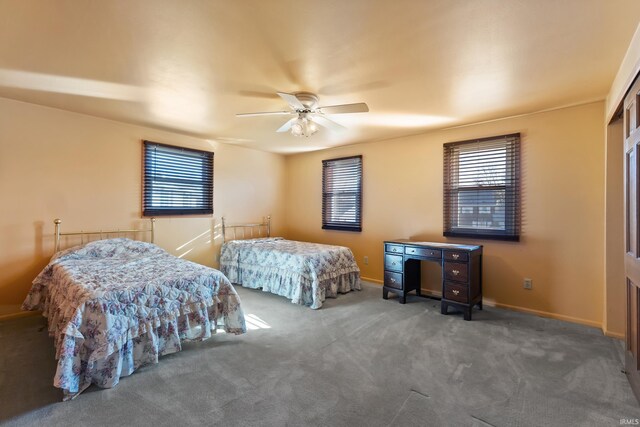 3323 Kiowa Ct, Fort Wayne, IN 46815 - bedroom featuring baseboards, carpet floors, and ceiling fan