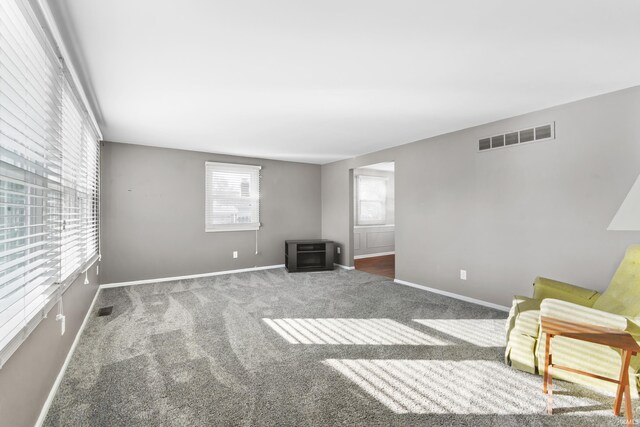 3323 Kiowa Ct, Fort Wayne, IN 46815 - unfurnished room featuring baseboards, carpet flooring, and visible vents