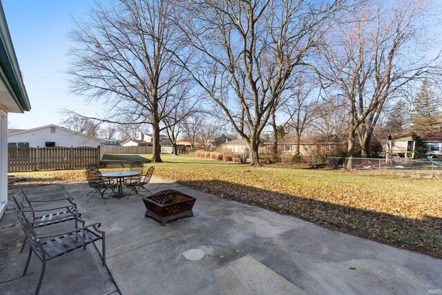 3323 Kiowa Ct, Fort Wayne, IN 46815 - view of patio / terrace featuring a fenced backyard and an outdoor fire pit