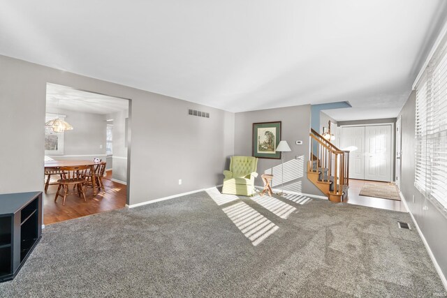 3323 Kiowa Ct, Fort Wayne, IN 46815 - sitting room with visible vents, a healthy amount of sunlight, and carpet