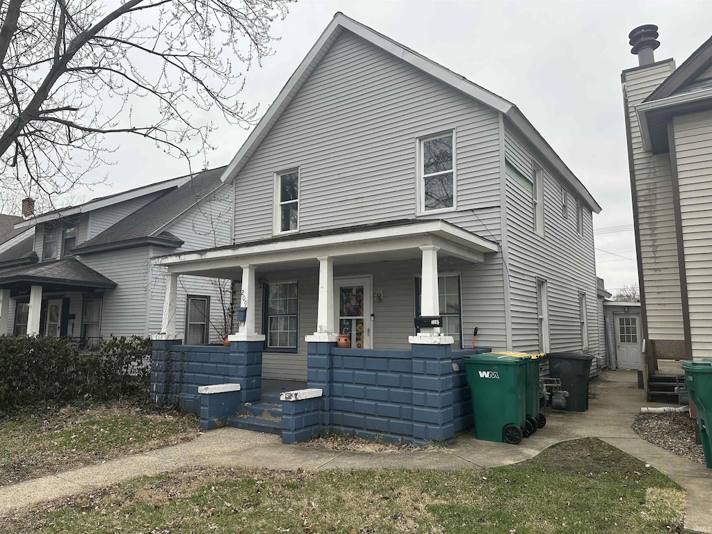 view of front of property featuring covered porch