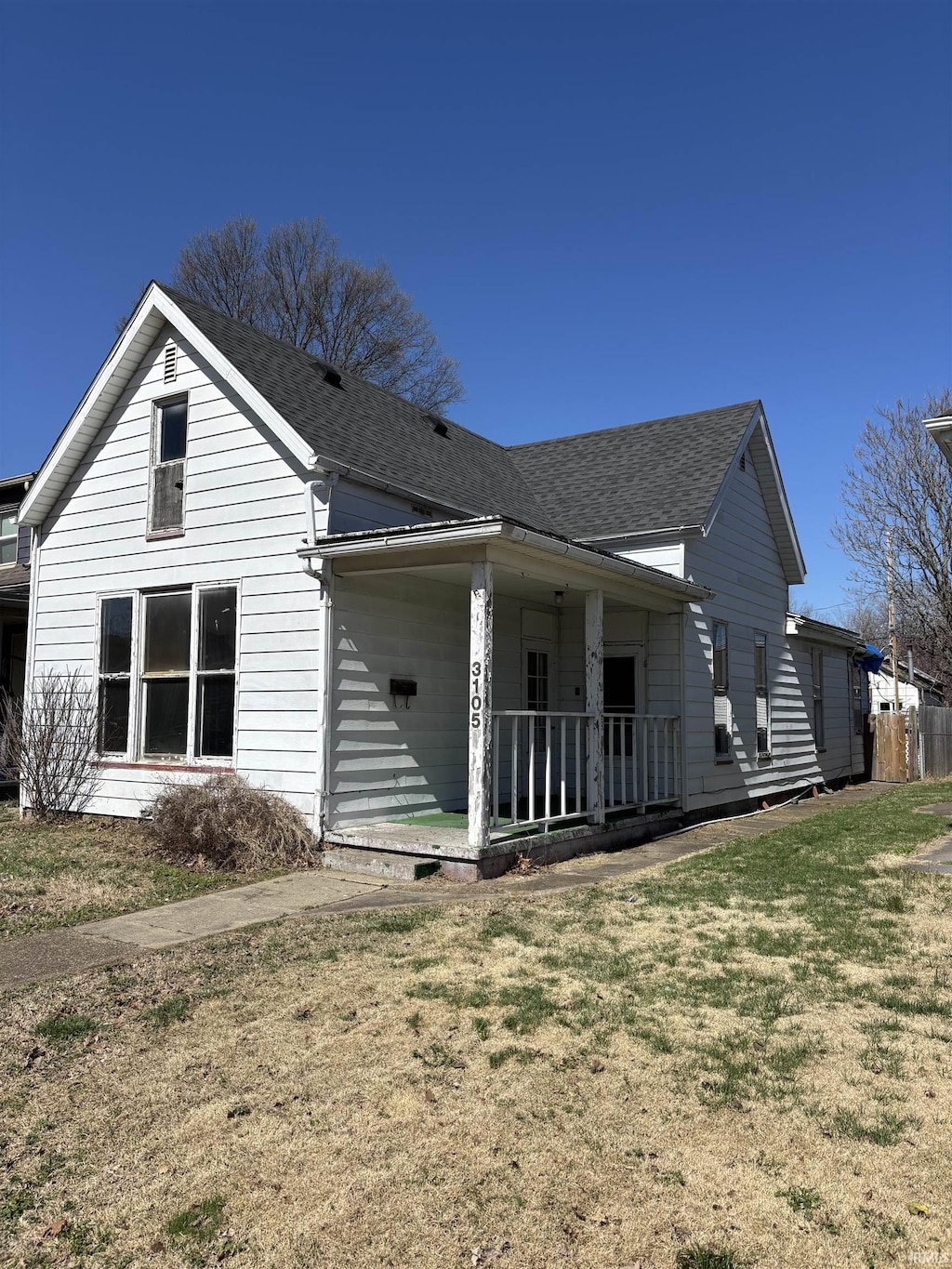 3105 Arlington Ave, Evansville, IN 47712 - back of house featuring a lawn and a shingled roof