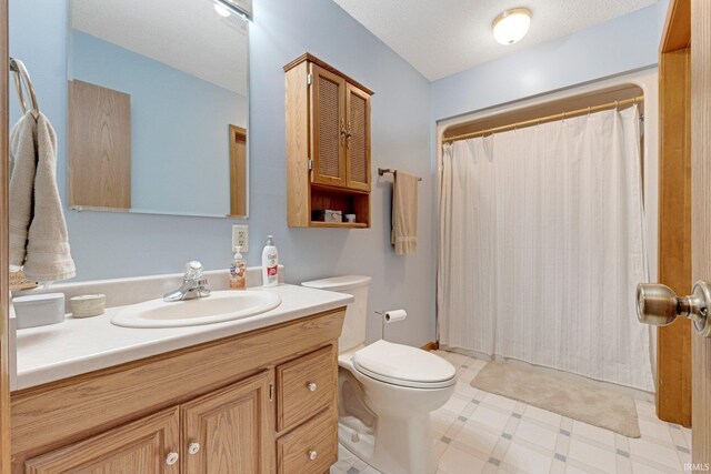6027 Old Brook Dr, Fort Wayne, IN 46835 - bathroom featuring toilet, tile patterned floors, vanity, and a shower with curtain