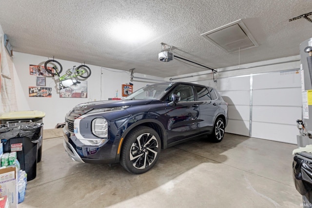 6027 Old Brook Dr, Fort Wayne, IN 46835 - garage featuring a garage door opener