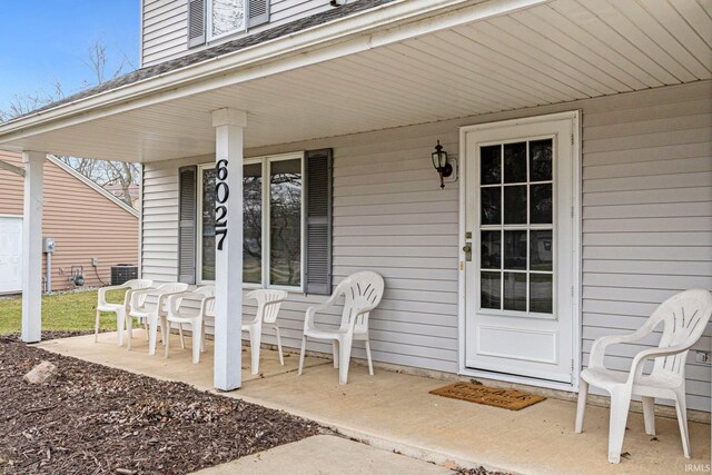 6027 Old Brook Dr, Fort Wayne, IN 46835 - view of patio featuring covered porch and central AC