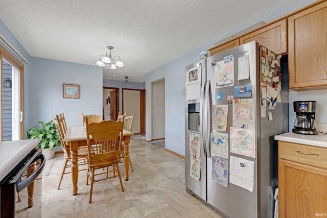 6027 Old Brook Dr, Fort Wayne, IN 46835 - dining room with a textured ceiling, baseboards, and an inviting chandelier