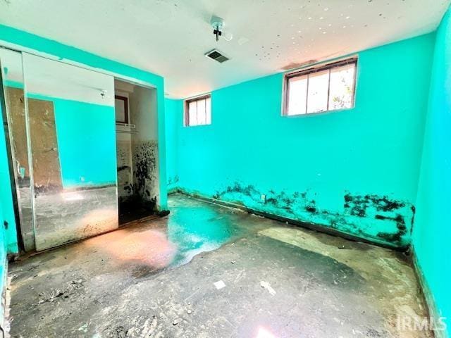 5011 Big Cynthiana Rd, Evansville, IN 47720 - misc room featuring visible vents and concrete flooring