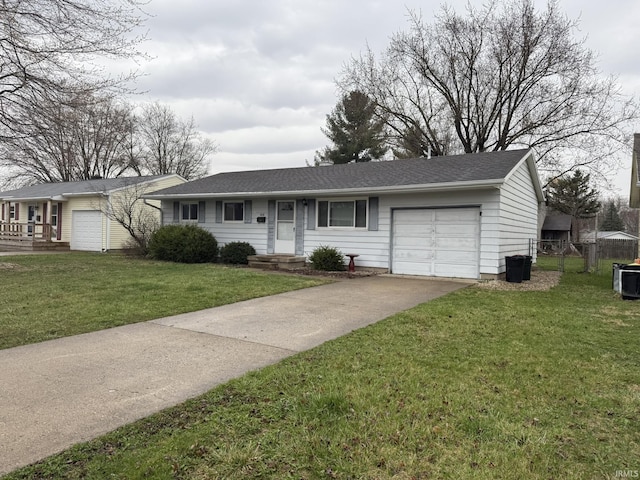 ranch-style home featuring fence, a garage, a front yard, roof with shingles, and driveway