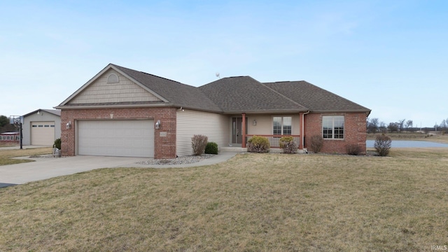 single story home with brick siding, a front yard, and driveway