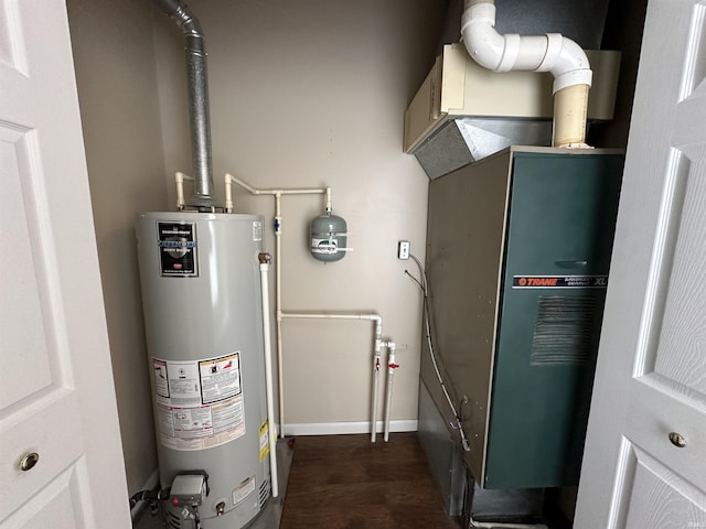 utility room with gas water heater