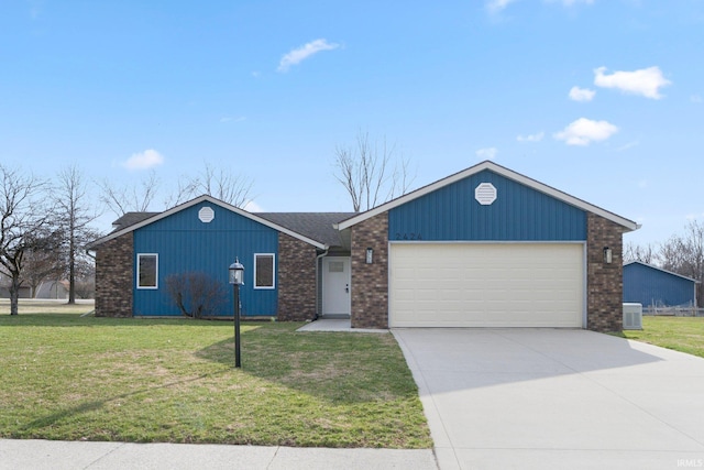 view of front of house with central AC unit, a garage, a front yard, brick siding, and driveway