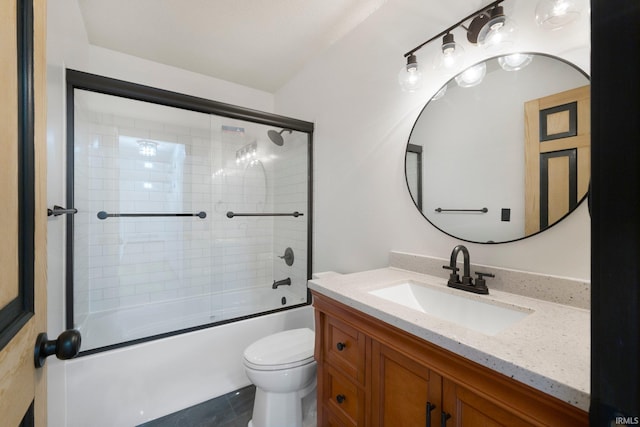 bathroom with tile patterned floors, bath / shower combo with glass door, toilet, and vanity