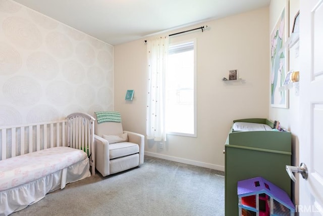 carpeted bedroom with baseboards