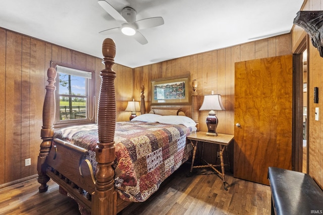 7990 S 150 E, Wolcottville, IN 46795 - bedroom with ceiling fan, wood finished floors, and wooden walls