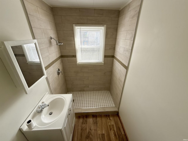 1116 Stanley Ave, Evansville, IN 47711 - full bath with vanity, wood finished floors, and tiled shower
