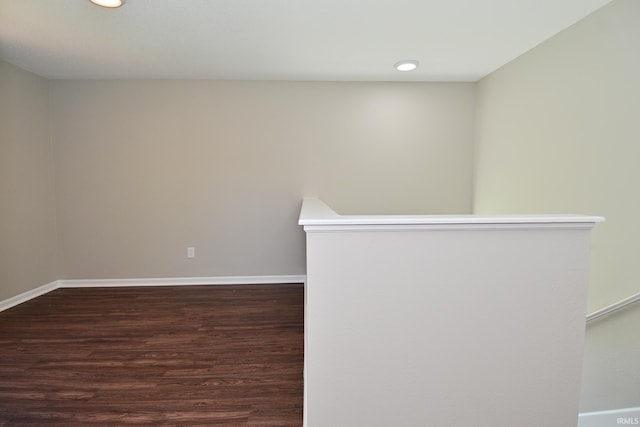 3843 S Bushmill Dr, Bloomington, IN 47403 - spare room featuring dark wood-style flooring, baseboards, and recessed lighting