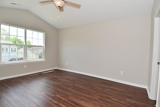 3843 S Bushmill Dr, Bloomington, IN 47403 - unfurnished room with ceiling fan, dark wood-style floors, vaulted ceiling, and baseboards